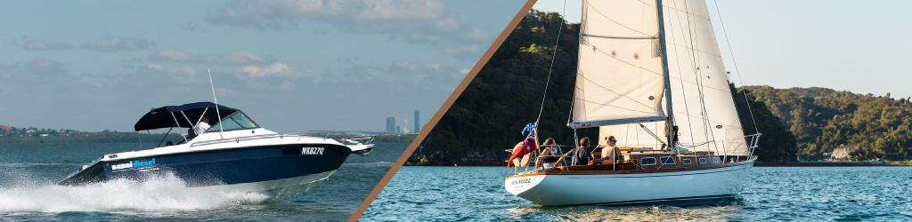 Powerboat and sailboat at sea