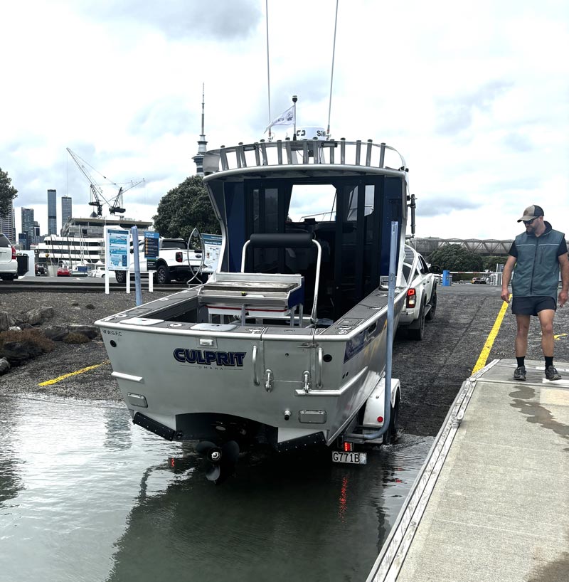 Trailer boat 'Culprit' being launched at boat ramp